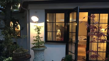 Deluxe Quadruple Room, Private Bathroom | Courtyard view