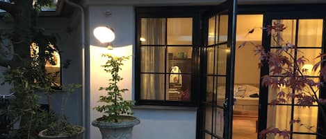 Deluxe Quadruple Room, Private Bathroom | Courtyard view