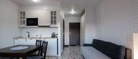 Studio (A 18) | Woonkamer | Flatscreentelevisie