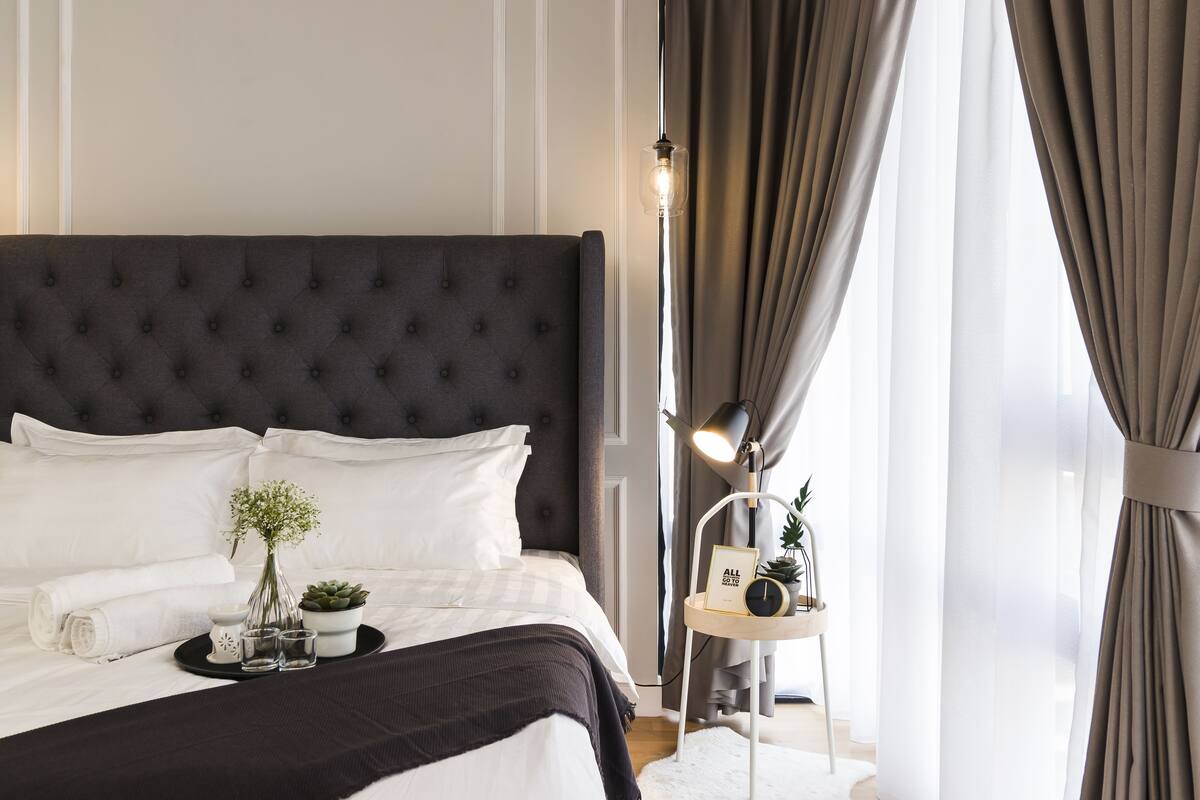 Premium bedding, pillow-top beds, blackout curtains, soundproofing