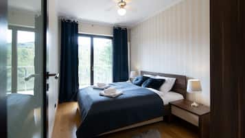 Apartment (303) | Laptop workspace, iron/ironing board, bed sheets