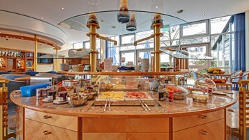 Daily buffet breakfast (EUR 18 per person)