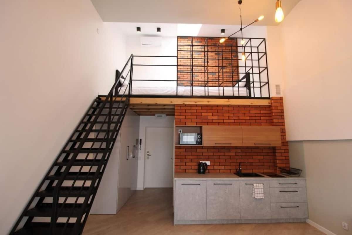 Departamento Confort (number 306) | Cocina privada | Refrigerador con congelador, microondas, horno y parrilla de estufa