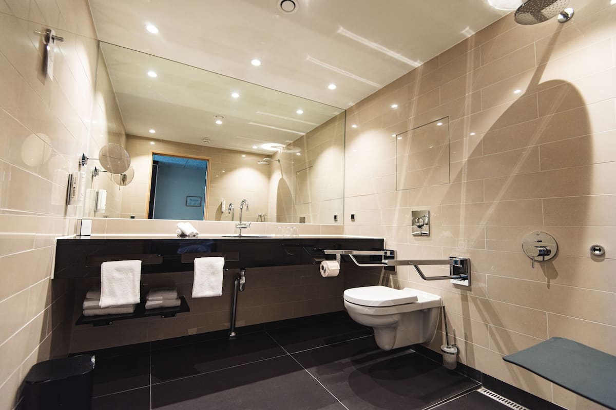 superior double room, accessible | bathroom | shower, rainfall showerhead, eco-friendly toiletries, hair dryer