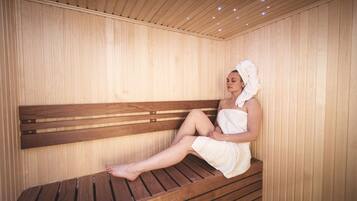 A wooden bench in a room with vertical wooden paneling.