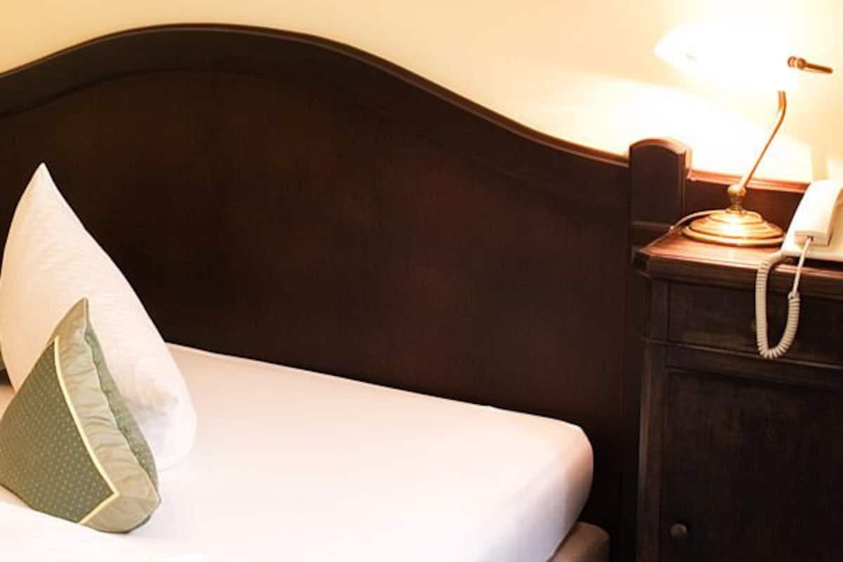 Einzelzimmer | 1 Schlafzimmer, Minibar, laptopgeeigneter Arbeitsplatz
