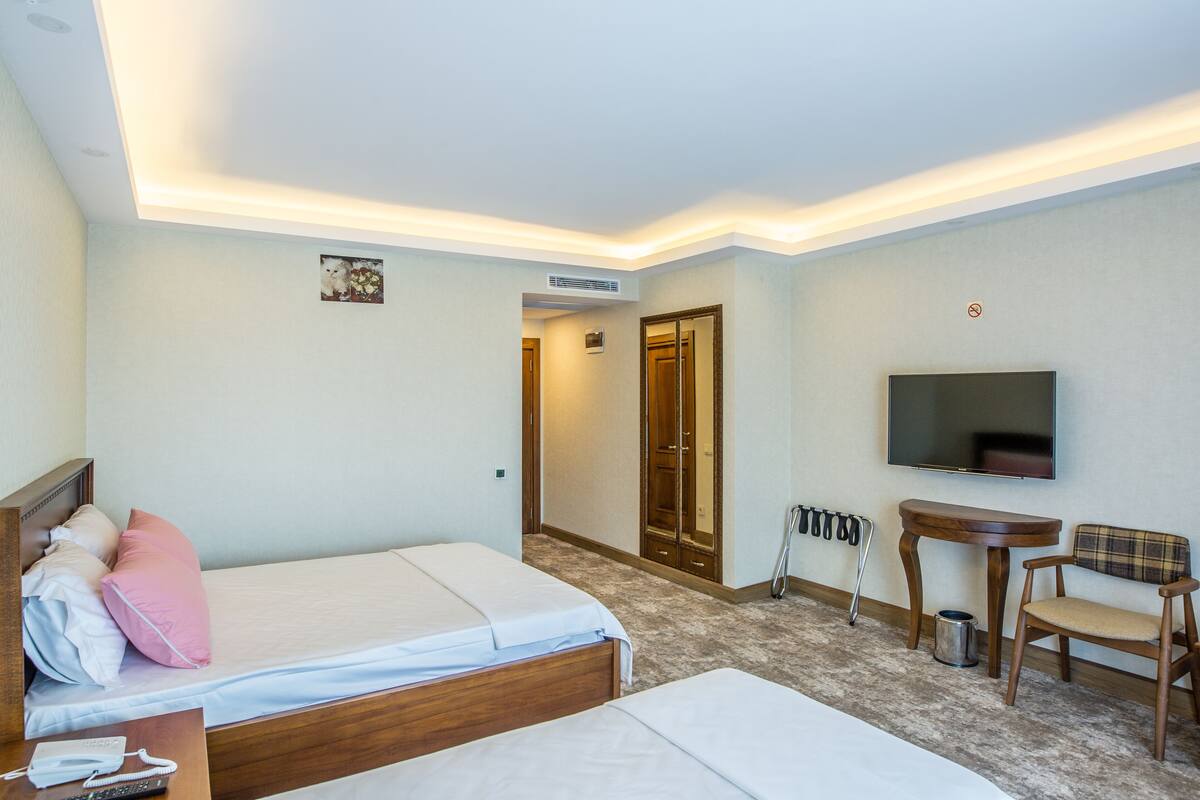 Premium bedding, minibar, desk, laptop workspace