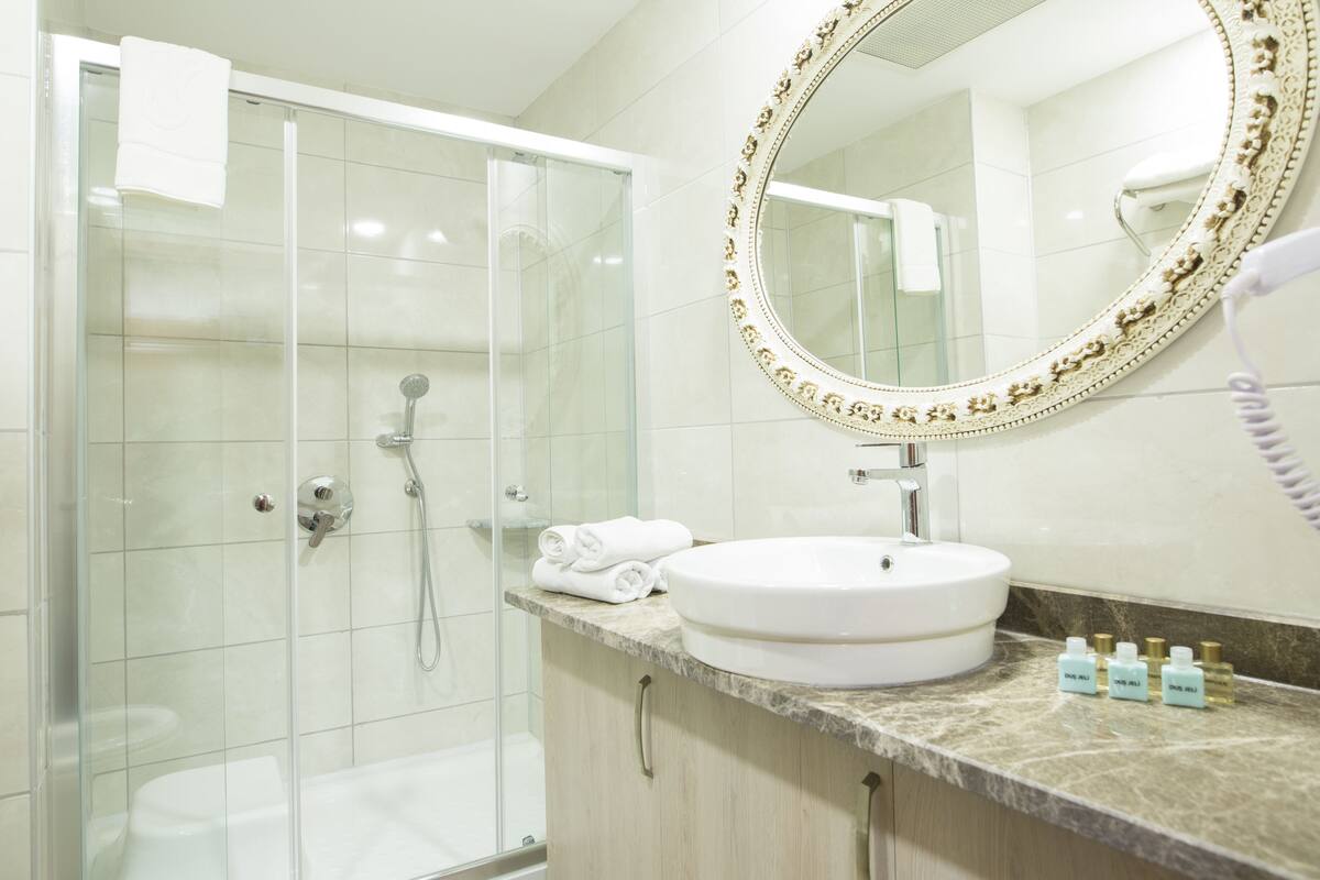 free toiletries, hair dryer, slippers, towels