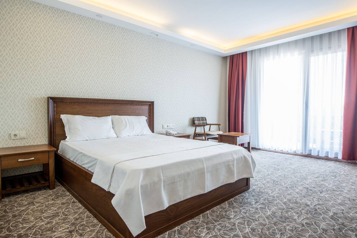 Premium bedding, minibar, desk, laptop workspace