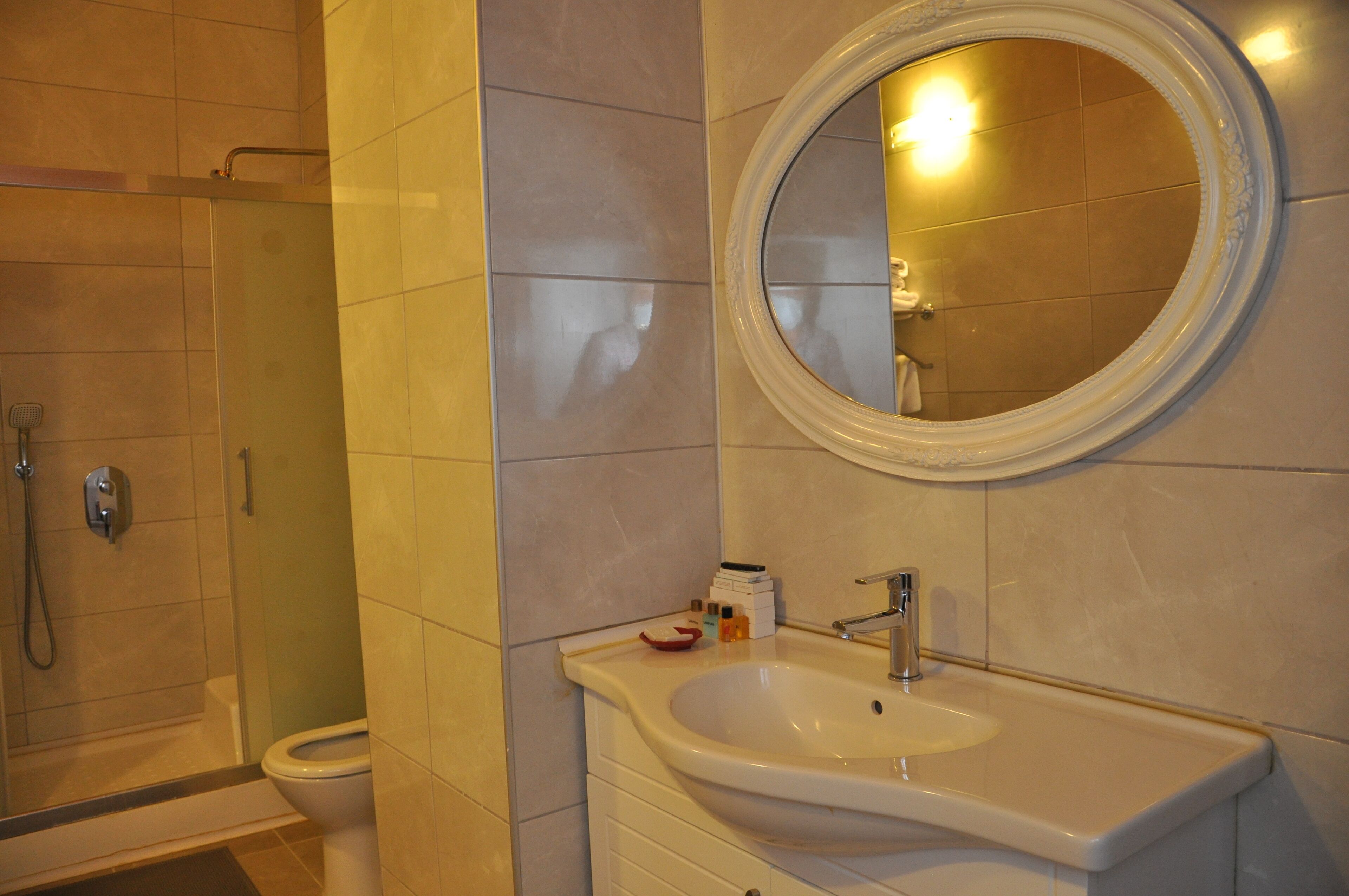 family suite, 2 bedrooms, terrace | bathroom | free toiletries, hair dryer, slippers, towels