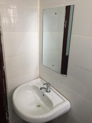 Shower, towels, soap, toilet paper