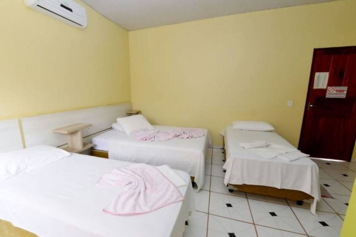 Habitación triple | Minibar, escritorio, wifi gratis y ropa de cama