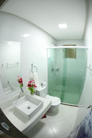 Shower, towels, soap, toilet paper