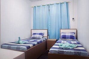 Individually decorated, free WiFi, bed sheets - Providence Travellers Inn (Tagbilaran)