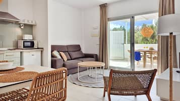 Apartment, 1 Bedroom, Terrace | Living area | Flat-screen TV