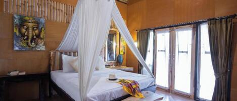 Deluxe Room, Garden View | Desk, soundproofing, free WiFi, bed sheets