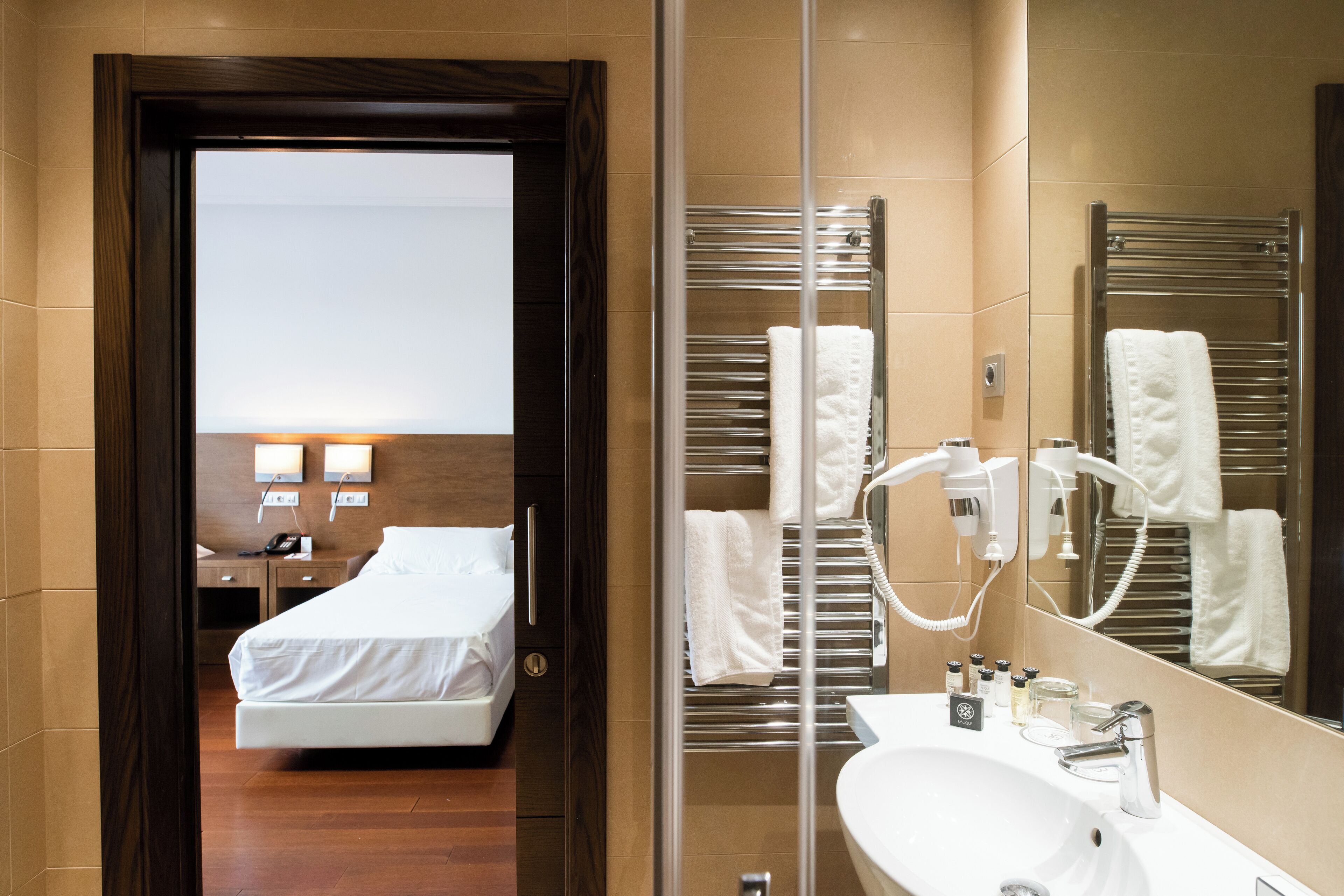 double or twin room | minibar, in-room safe, desk, laptop workspace