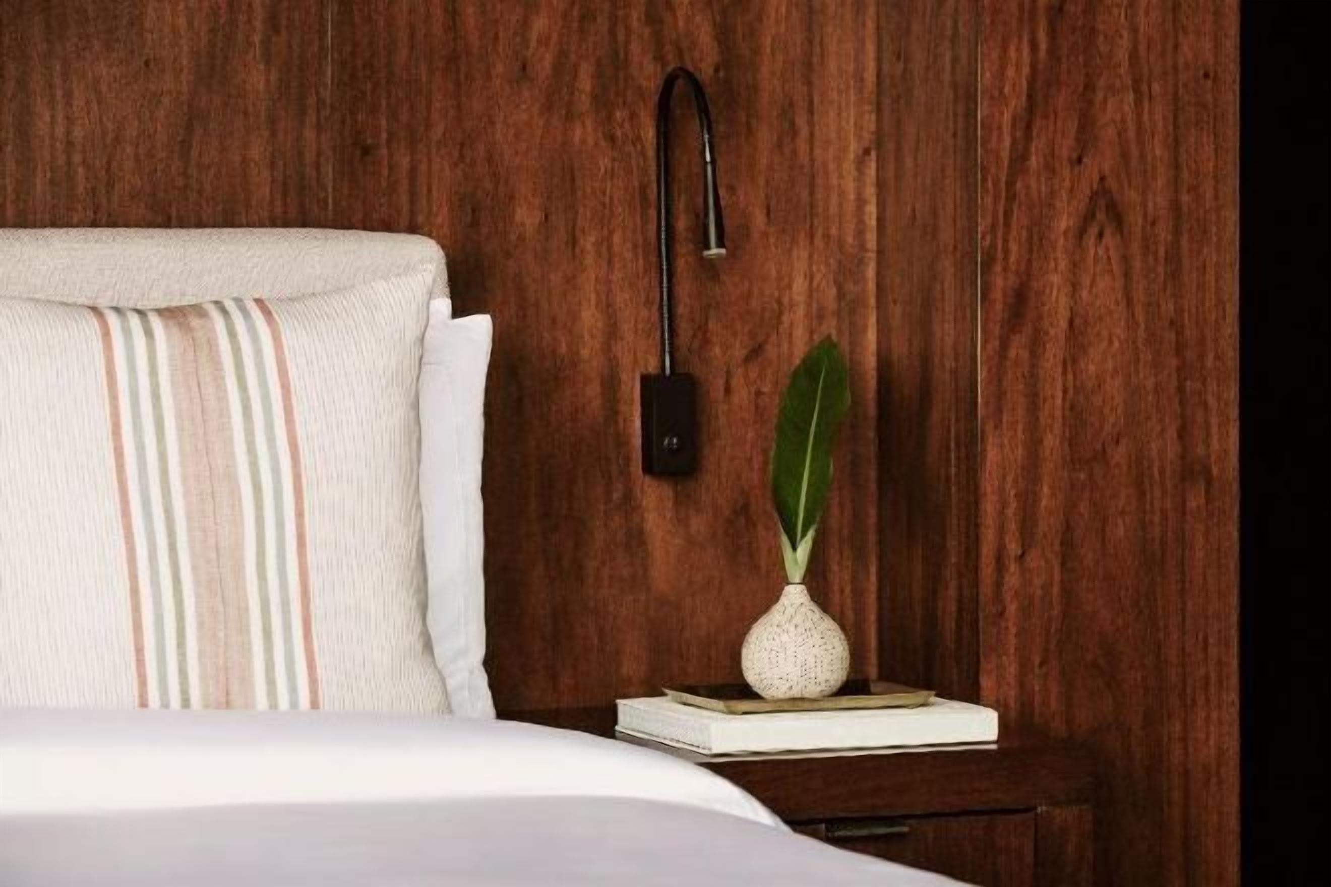 Premium bedding, memory-foam beds, minibar, in-room safe