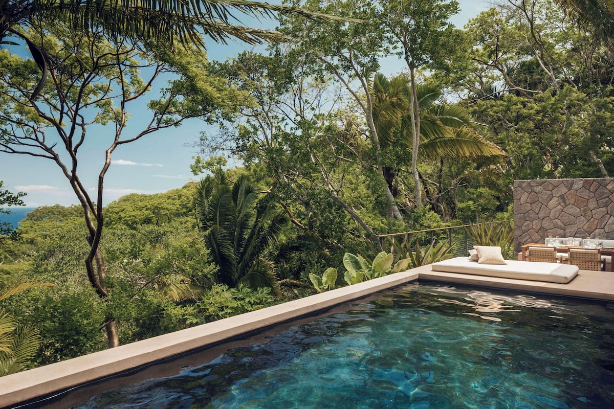 5 outdoor pools, open 10:00 AM to 6:00 PM, pool umbrellas, sun loungers