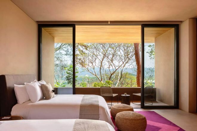 Premium bedding, memory-foam beds, minibar, in-room safe