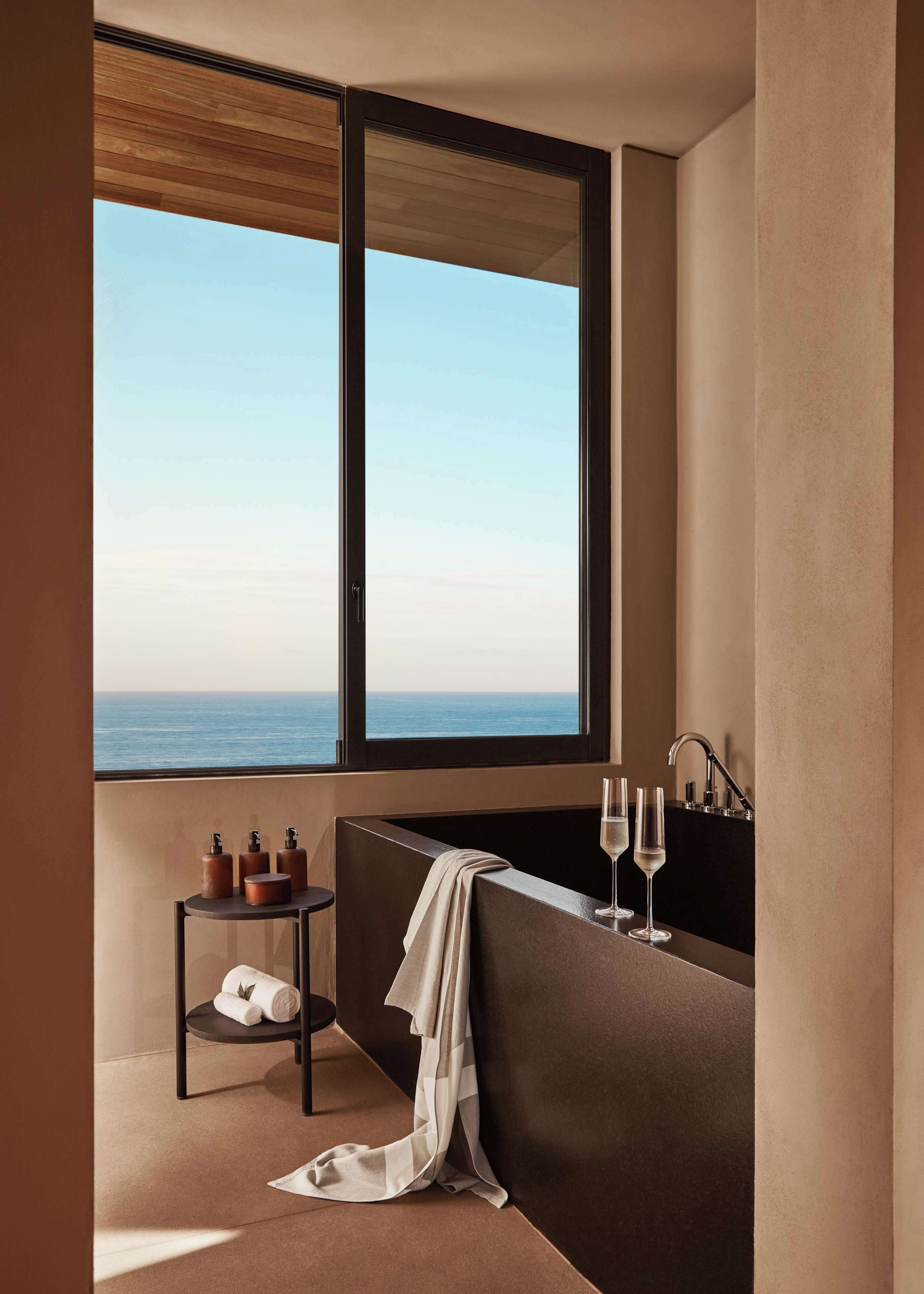 Separate bathtub and shower, rainfall showerhead, free toiletries