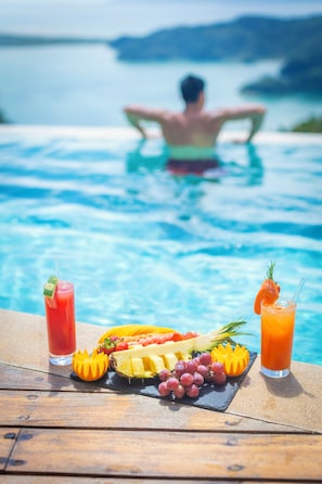 Outdoor pool, pool umbrellas, sun loungers