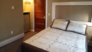 Cabana superluxo, 2 quartos | Camas com colchões de espuma com sistema de memória, cortinas blackout