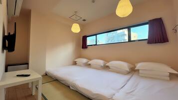 Economy Quadruple Room, Non Smoking, Shared Bathroom | Free WiFi, bed sheets