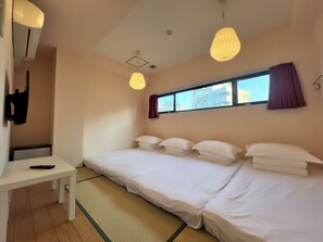 Economy Quadruple Room, Non Smoking, Shared Bathroom