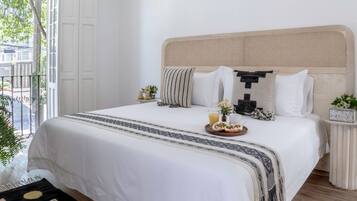 Apartamento com design assinado | 2 quartos, roupas de cama premium, edredons de pluma, escrivaninha