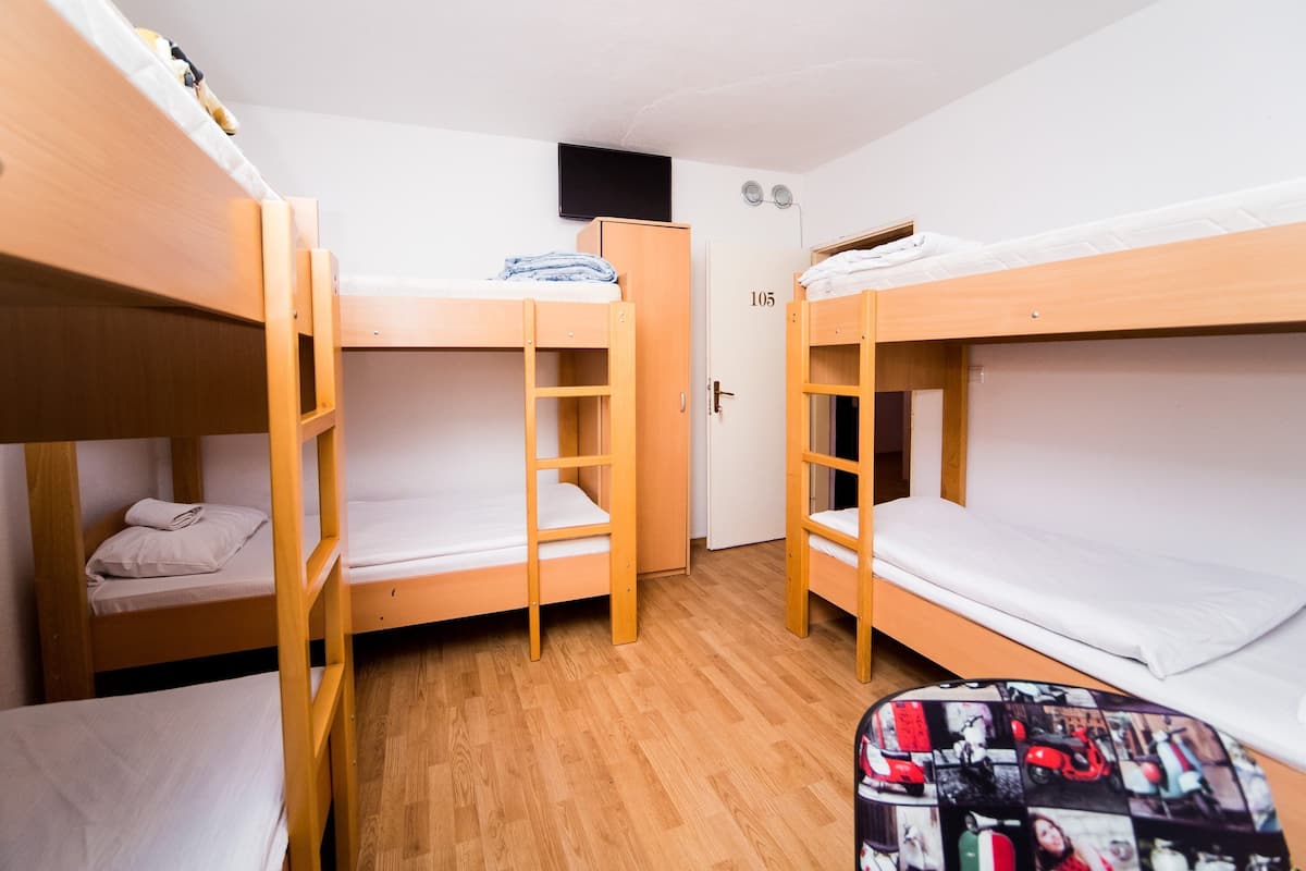 Bed in 6-Bed Dormitory | Desk, laptop workspace, blackout drapes, soundproofing
