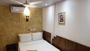 Minibar, desk, blackout curtains, iron/ironing board