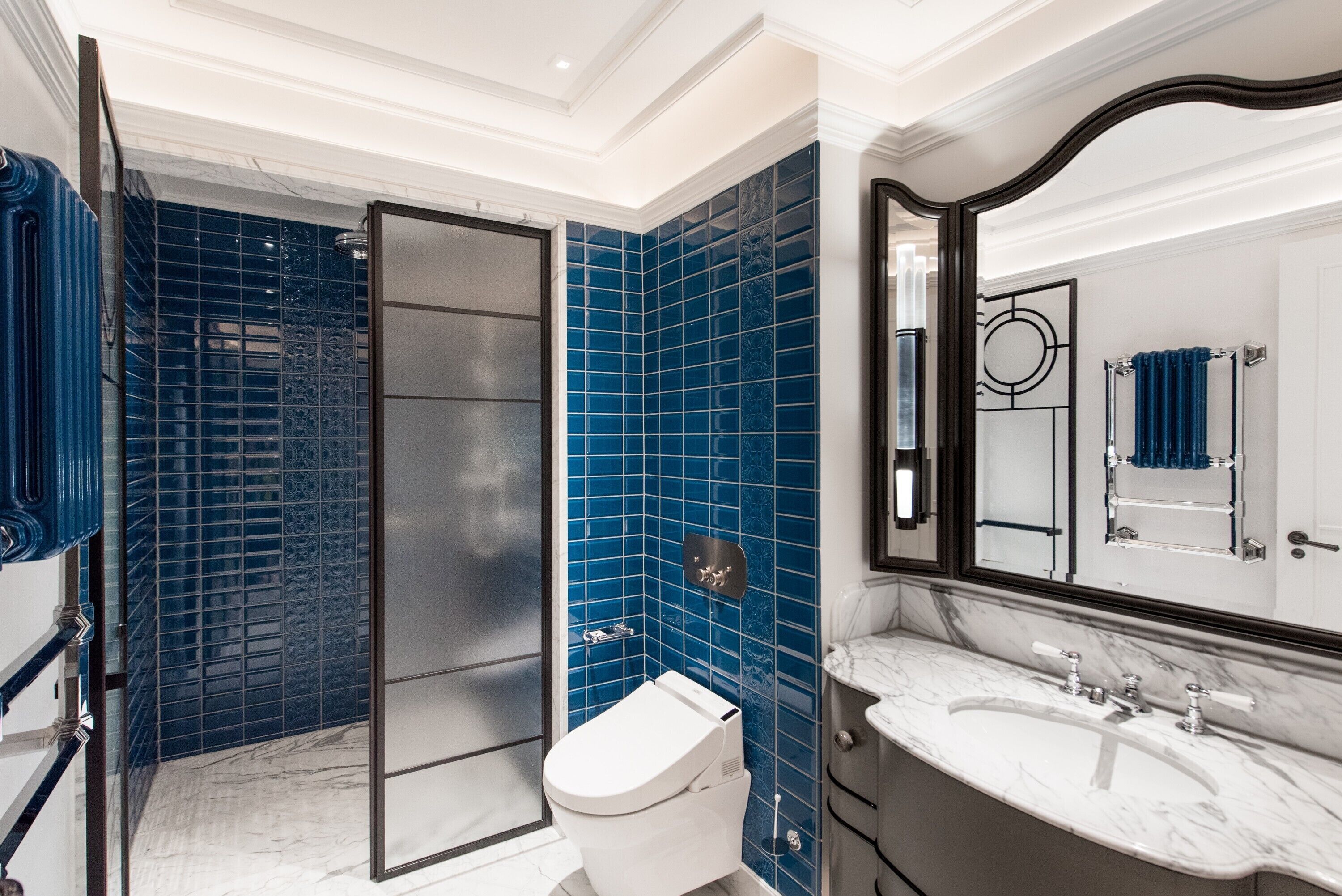 designer toiletries, hair dryer, bathrobes, slippers