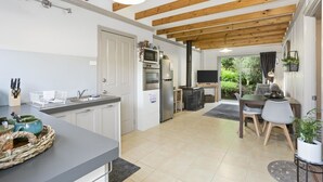 Studio Apartment | Private kitchen | Full-size fridge, microwave, oven, stovetop