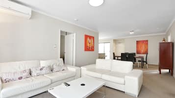 City Apartment, 2 Bedrooms | Living area | LCD TV, DVD player