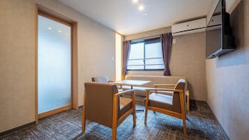 Family Suite | Living area | LED TV