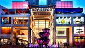 A multi-story shopping mall with a prominent 'PAVILLION' sign. - Ark Batu Caves Hotel (Batu Caves)