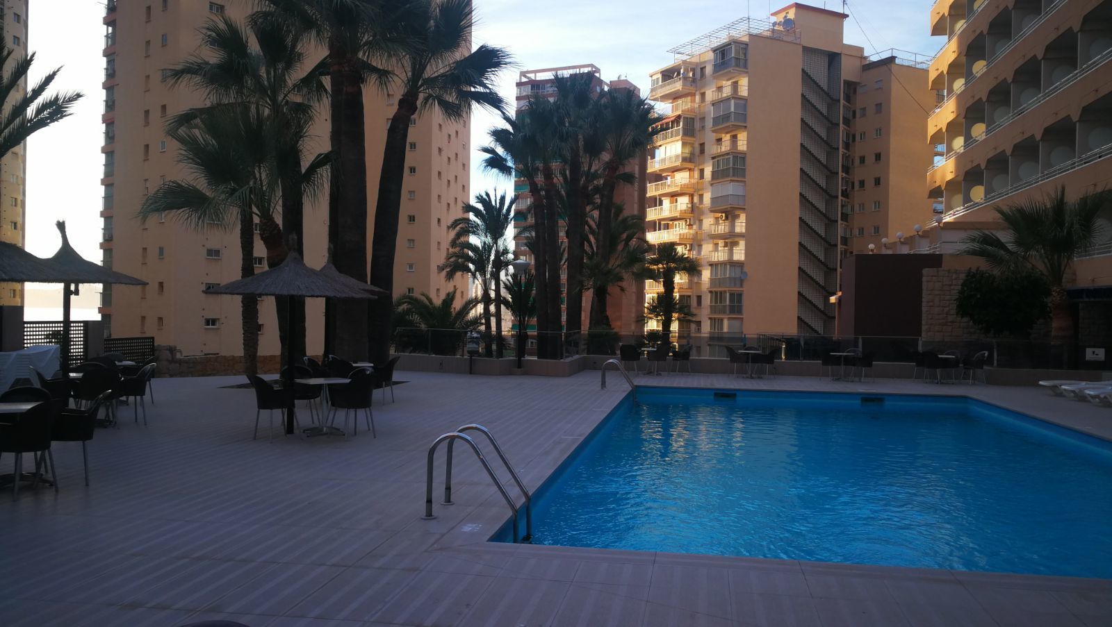 outdoor pool, open 10:00 am to 8:00 pm, pool loungers