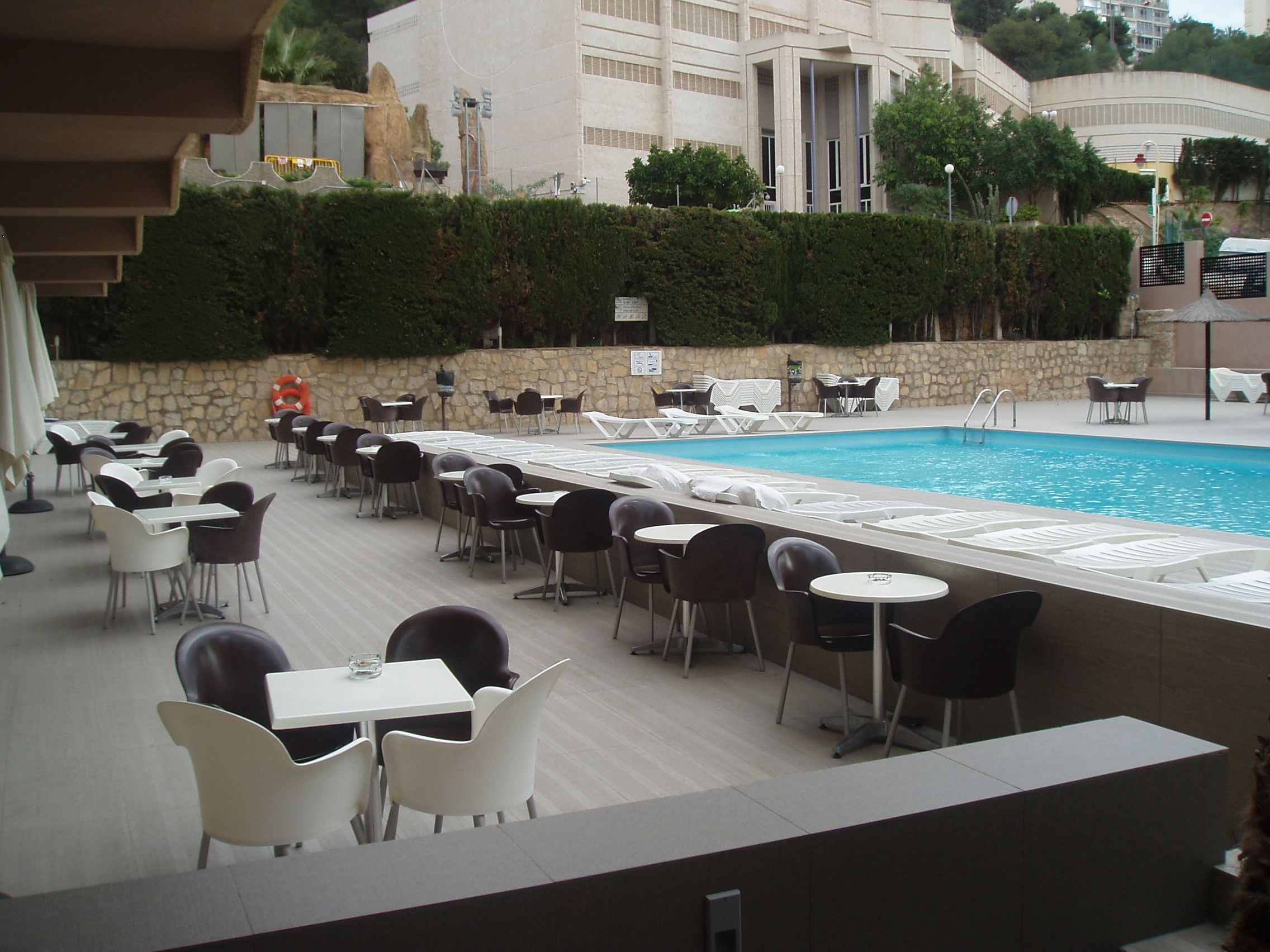 outdoor pool, open 10:00 am to 8:00 pm, pool loungers