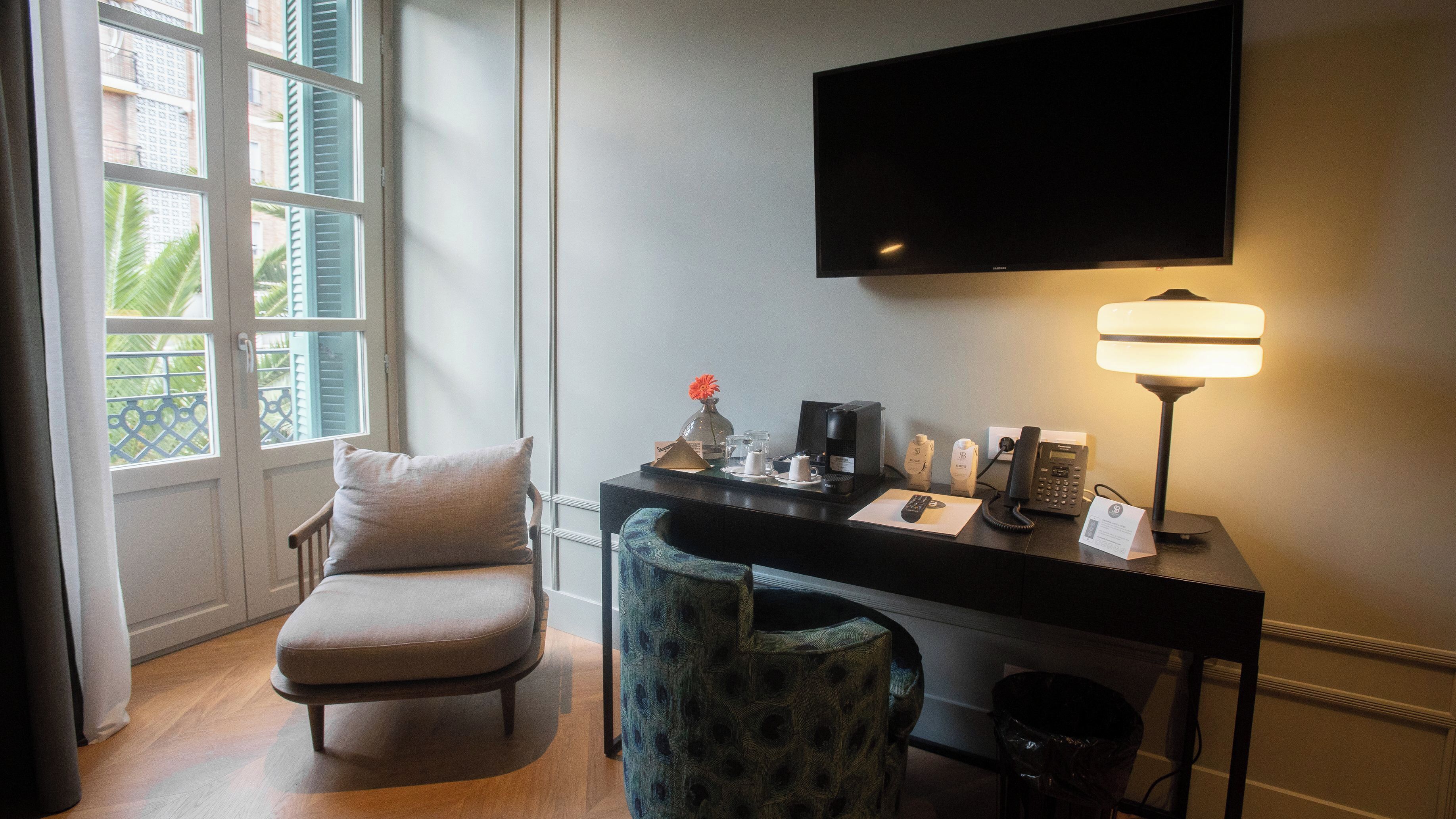 double or twin room | down duvets, minibar, in-room safe, desk