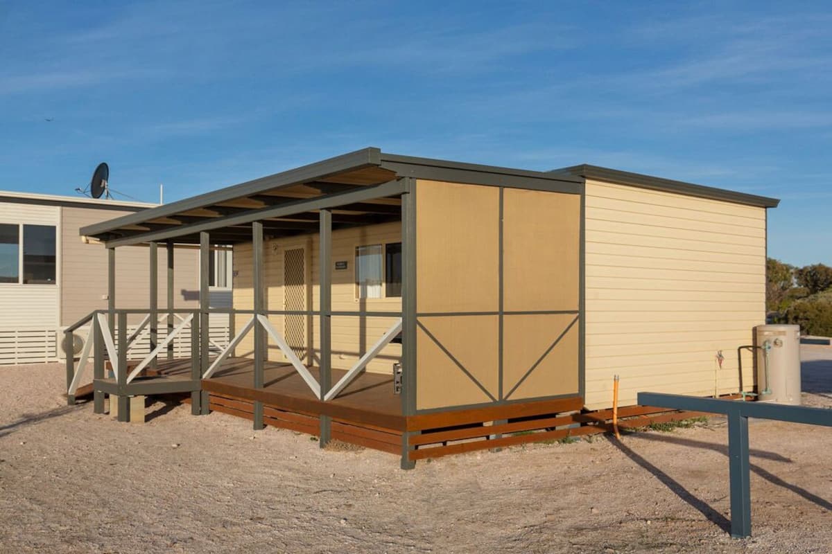 Cabana, 3 quartos | 2 quartos, cortinas blackout, ferros/tábuas de passar roupa