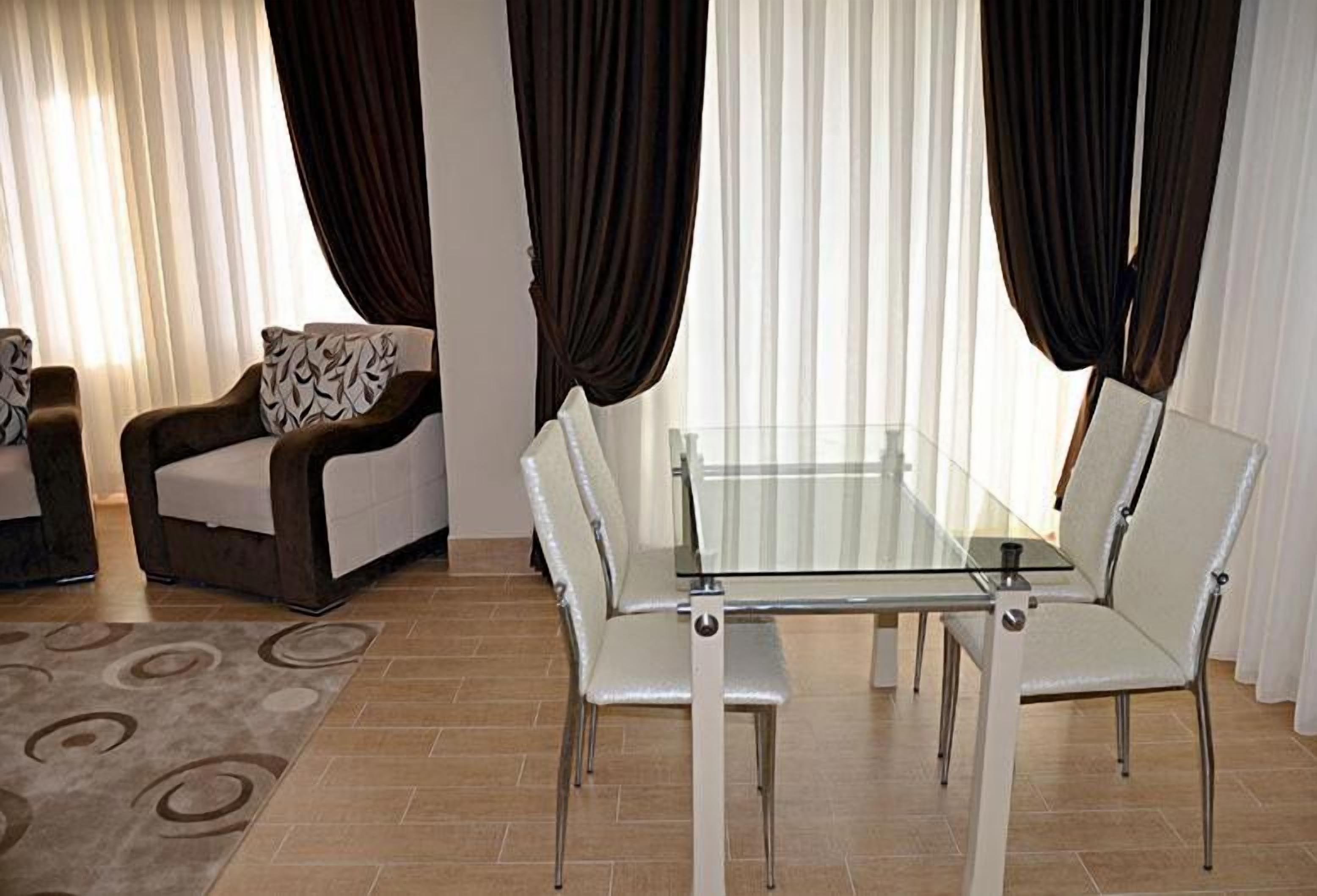 Apartment, 1 Bedroom | Living room | LCD TV