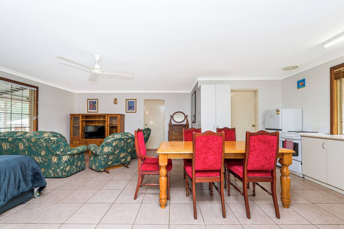 Premier Suite 2 Bedroom Self Contained | Living area | Flat-screen TV