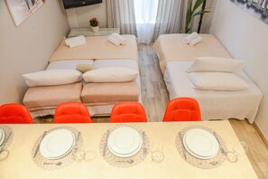 Apartment, 1 Schlafzimmer, Nichtraucher, Stadtblick | Wohnbereich