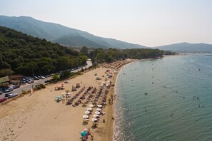 Beach nearby, white sand, sun-loungers, beach volleyball