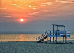 Beach nearby, white sand, sun-loungers, beach volleyball