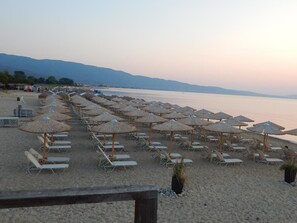 Beach nearby, white sand, sun-loungers, beach volleyball