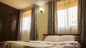 Iron/ironing board, free WiFi, bed sheets - Three Bedroom art themed apartment (Mukono)