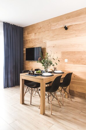 Classic Apartment | Living area | Flat-screen TV
