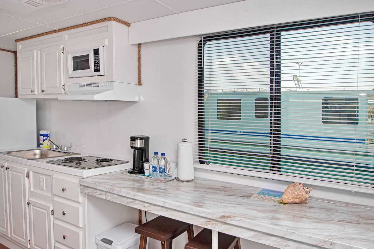 panoramic cabin, ocean view, overwater | living area